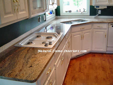 Vyara Granite 
with white cabinets